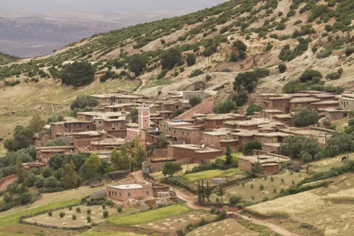 Framed Print : Houses made of mud and straw are typical architecture in a village in the foothills