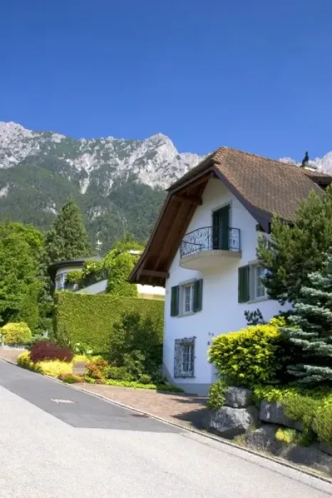 Framed Print : Housing in Lichtenstein with the Swiss Alps in the background Framed Print : Housing in Lichtenstein with the Swiss Alps in the background