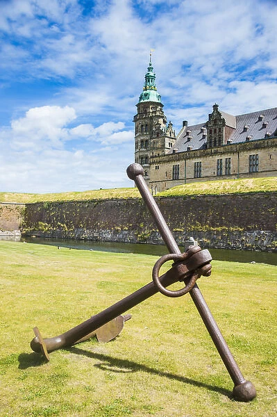 Huge old anchor before the Unesco world heritage sight Kronborg renaissance castle