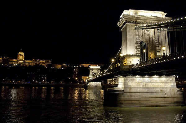 Hungary, Budapest. Night view of Chain Bridge from Pest across the Danube