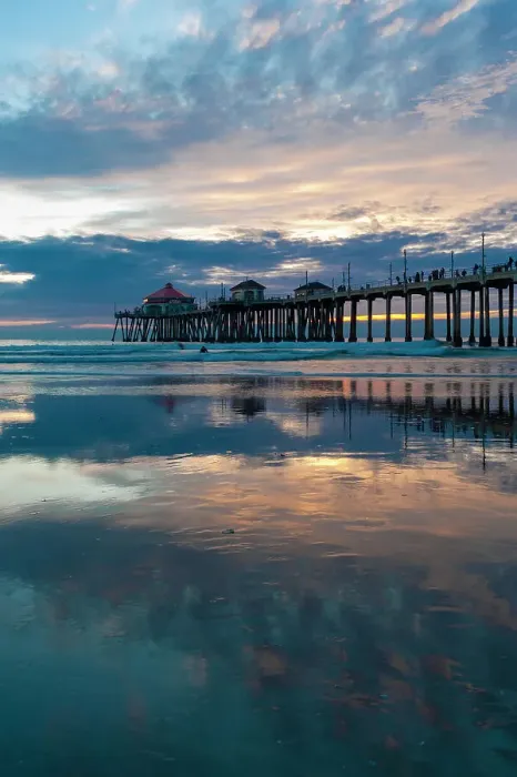 Framed Print : The Huntington Beach Pier and reflections on the wet beach at sunset. Huntington Beach, California Framed Print : The Huntington Beach Pier and reflections on the wet beach at sunset. Huntington Beach, California
