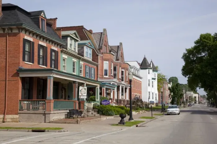 Framed Print : IA, Dubuque, Specialty Shops in historic buildings, on Bluff Street, built in 1800 s