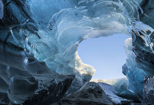 Ice cave in the glacier Breidamerkurjoekull in Vatnajoekull National Park. Entrance to the Ice Cave