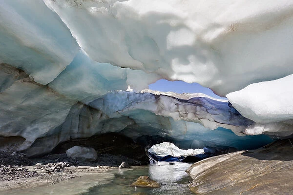 Ice cave and glacier snout of Schlatenkees, source of the creek Schlatenbach