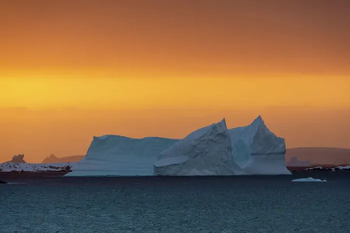 Framed Print : An iceberg at sunset in the Lemaire channel, Antarctica