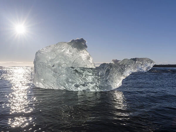icebergs on black volcanic beach. Beach of the north atlantic near the glacial lagoon Joekulsarlon