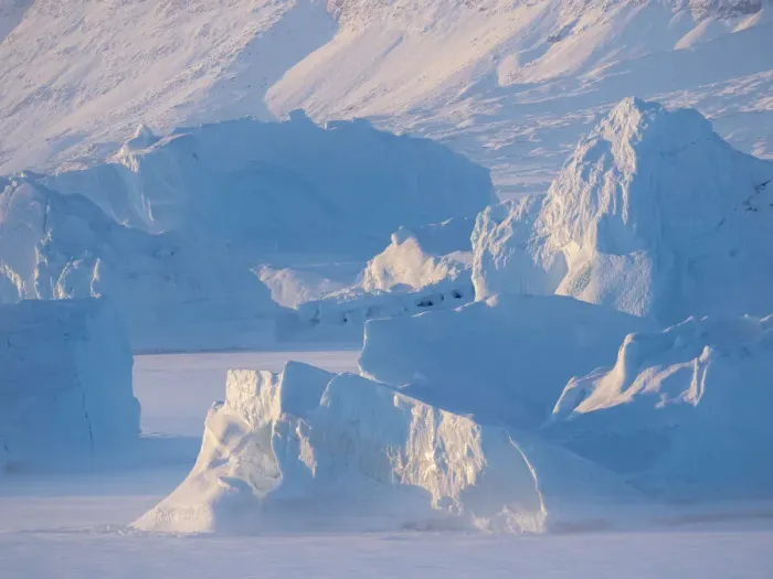 Framed Print : Icebergs frozen into the sea ice of the Uummannaq Fjord System during winter
