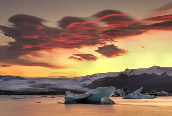 Framed Print : Icebergs from the Jokulsarlon glacier adrift in sunset in Jokulsarlon lagoon in Iceland