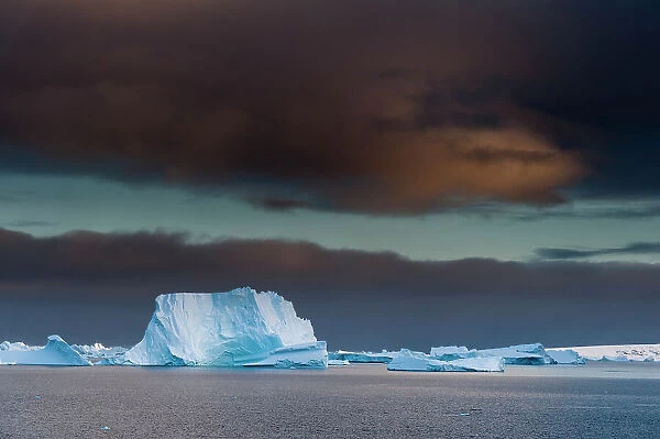 Icebergs under a stormy sky, Lemaire channel, Antarctica