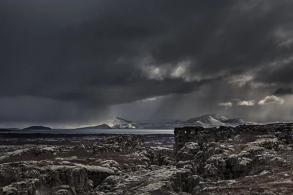 Iceland, Fagrabrekka, Thingvellir National Park. Storm clouds above an otherworldly landscape