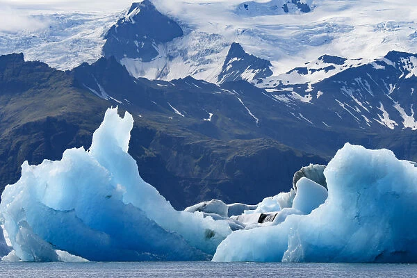 Iceland, floating glaciers form blue ice sculptures in Jokulsarlon, glacier lagoon