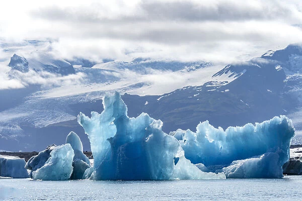 Iceland, floating glaciers form blue ice sculptures in Jokulsarlon, glacier lagoon
