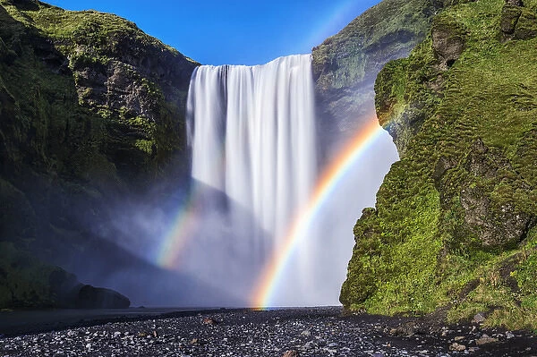 Iceland, Skogafoss. Waterfall and rainbow