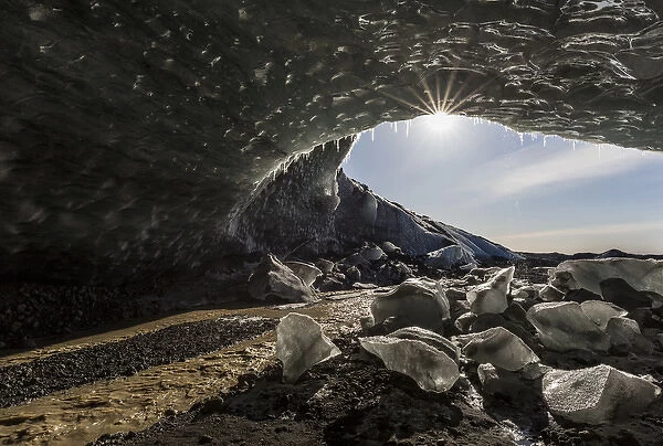 Iceland. Sunburst at ice cave entrance. Credit as: Bill Young  /  Jaynes Gallery  /  DanitaDelimont