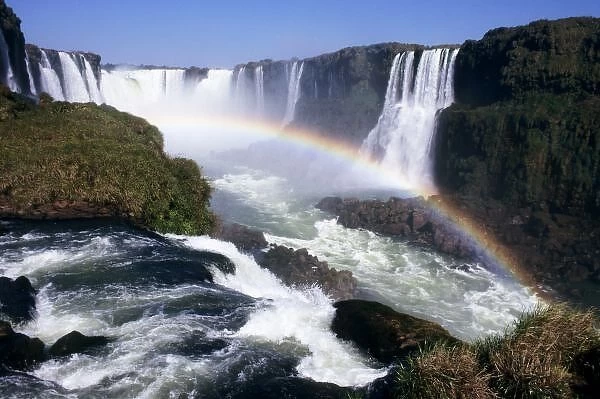 Iguassu Falls, Parana State, Brazil. Aerial view of the waterfalls with a rainbow over them