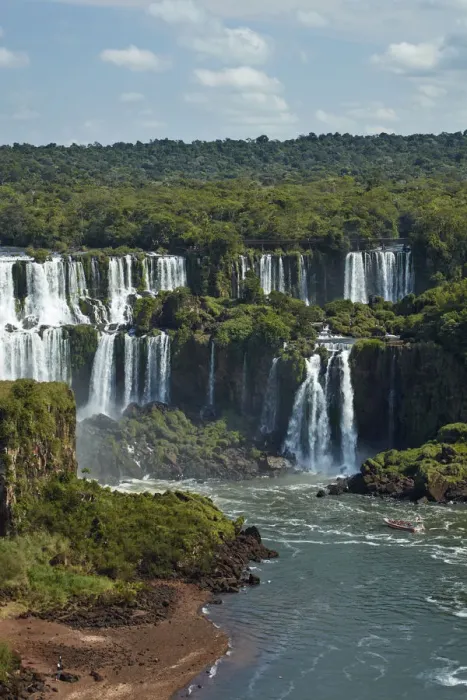 Framed Print : Iguazu Falls on Argentina side and tourist boat on Iguazu River, Brazil and Argentina