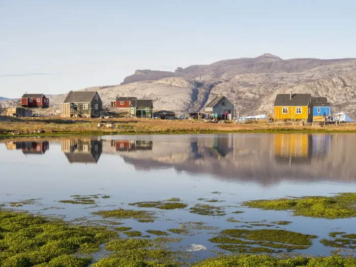 Framed Print : Ikerasak, a small traditional fishing village on Ikerasak Island in the Uummannaq fjord system