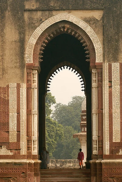 India, Delhi. Constructed with red sandstone and marble, The Qutub Minar Complex