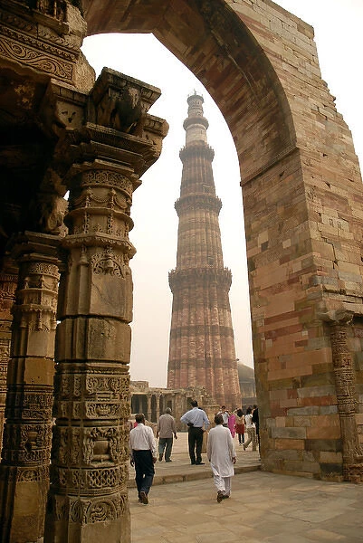 India, Delhi. Constructed with red sandstone and marble, The Qutub Minar is the tallest