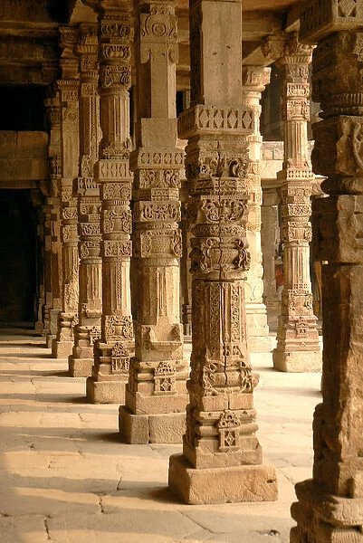 India, Delhi. Constructed with red sandstone and marble, The Qutub Minar Complex