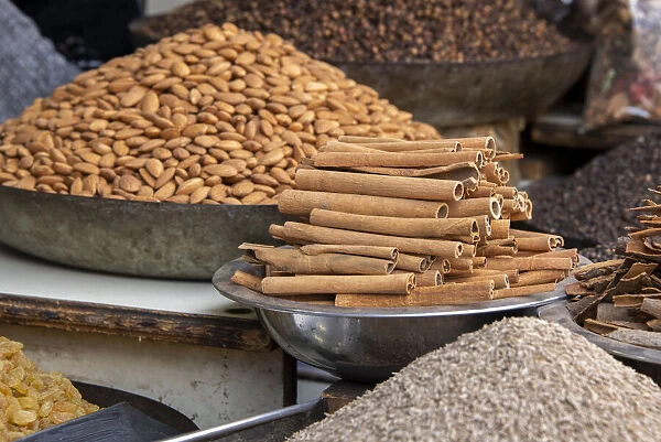 India, Delhi, Old Delhi. Old Delhi street market. Mixed nuts, spices and cinnamon sticks