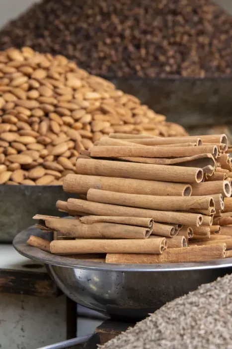 Framed Print : India, Delhi, Old Delhi. Old Delhi street market. Mixed nuts, spices and cinnamon sticks Framed Print : India, Delhi, Old Delhi. Old Delhi street market. Mixed nuts, spices and cinnamon sticks
