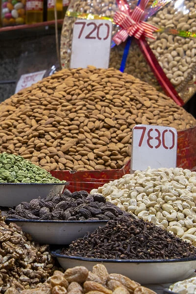 India, Delhi, Old Delhi. Old Delhi street market. Assorted nuts, spices and snacks