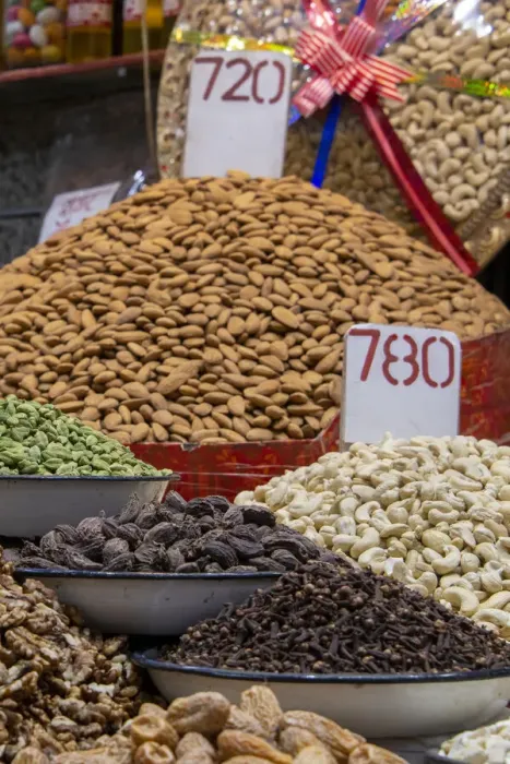 Framed Print : India, Delhi, Old Delhi. Old Delhi street market. Assorted nuts, spices and snacks Framed Print : India, Delhi, Old Delhi. Old Delhi street market. Assorted nuts, spices and snacks