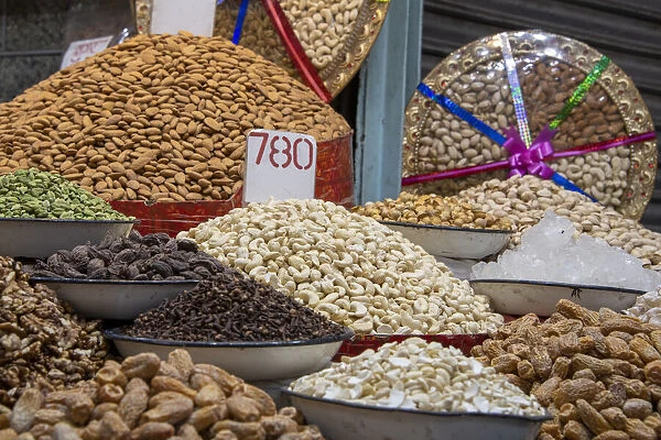 India, Delhi, Old Delhi. Old Delhi street market. Assorted nuts, spices and snacks