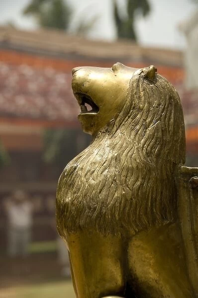 India, Goa. Hindu Mahalsa Temple, brass lion