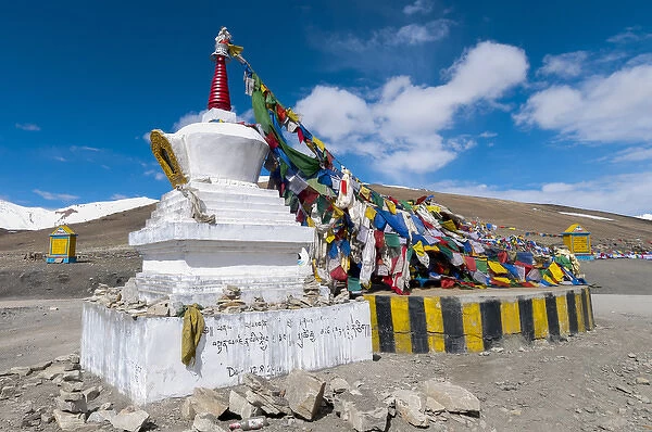 India, Jammu & Kashmir, Ladakh large chorton festooned with prayer flags at the top of the 17