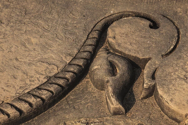India, Madhya Pradesh, Chhatarpur District, Khajuraho, Detail of stone carving on step