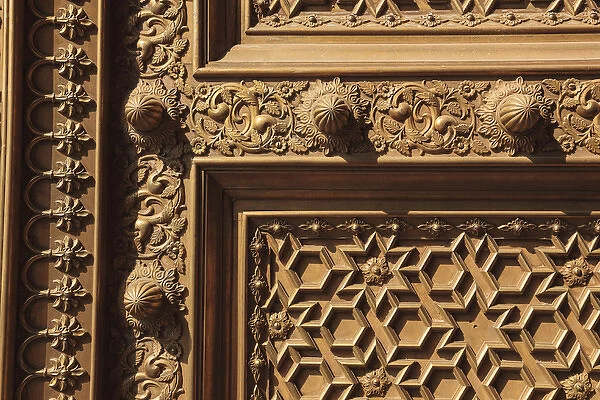 India, Rajasthan, Jaipur, City Palace, Detail of carved wooden door