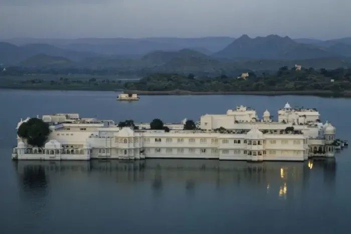 Framed Print : India, Udaipur. View of City Palace, now a museum, from Lake Palace Hotel on Pichola Lake
