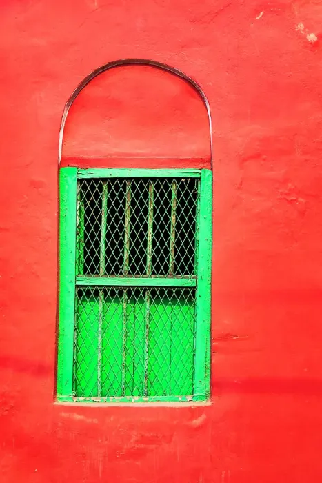 Framed Print : India, West Bengal, Kolkata, College Square. Bright green window in bright red wall