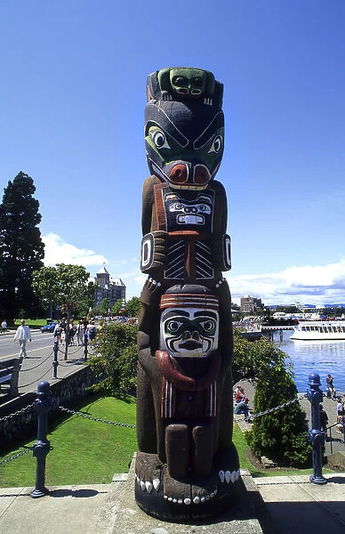 Indian art work of Kwakiutl Bear Totem Pole in beautiful Victoria British Columbia Canada