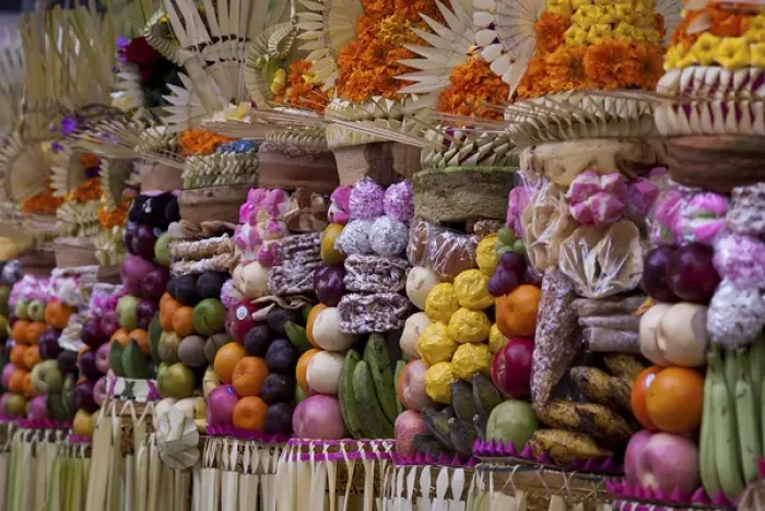 Framed Print : Indonesia, Bali, Bedulu. Row of colorful offerings at Pura Samuan Tiga temple. Credit as