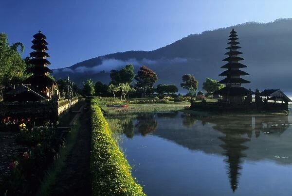 Indonesia, Bali, Candikuning. Meru thatched-roof pagoda of Pura (Temple) Ulu Danau on Lake Bratan