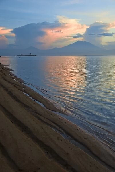 Indonesia, Bali. Sunrise on Sanur Beach with Mount Gunung Agung in distance