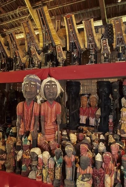 Indonesia, Sulawesi, Tana Toraja Region. Carved Tau Tau (effigies) in shop