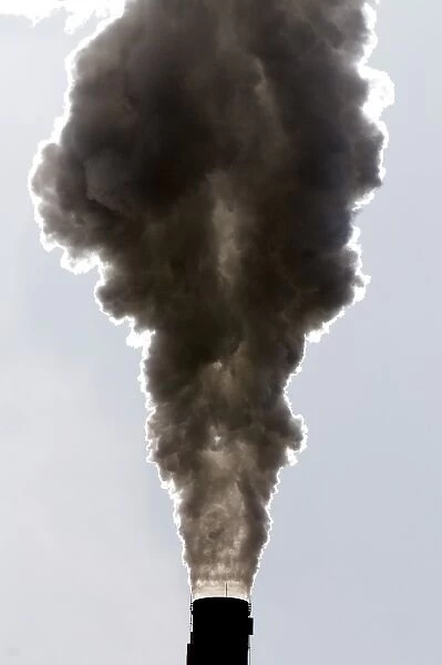 Industrial smokestack venting hot flue gases