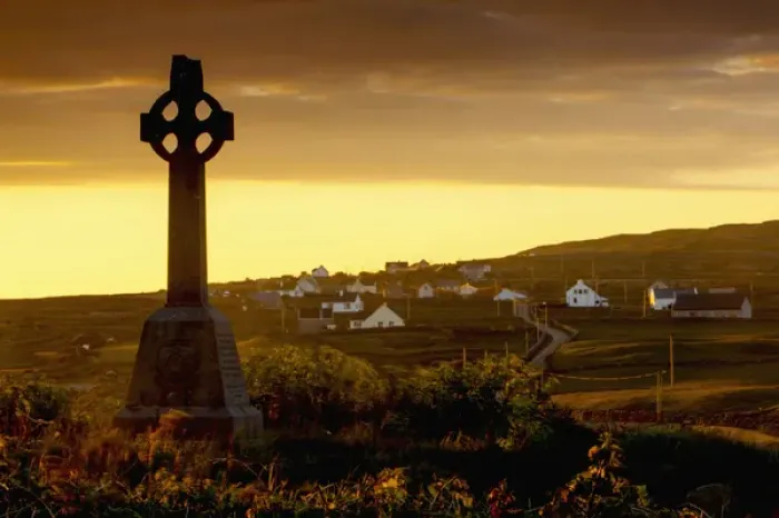 Framed Print : Inishmore Island. Aran Islands. Ireland. Celtic cross in sunset