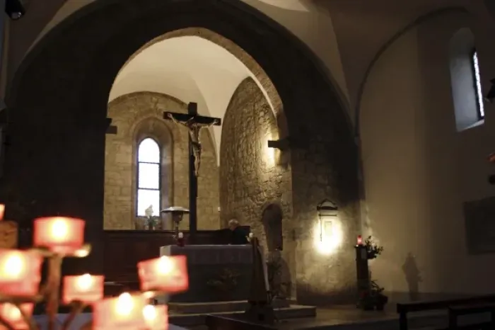 Framed Print : Inside the Romanesque church: tree of candles