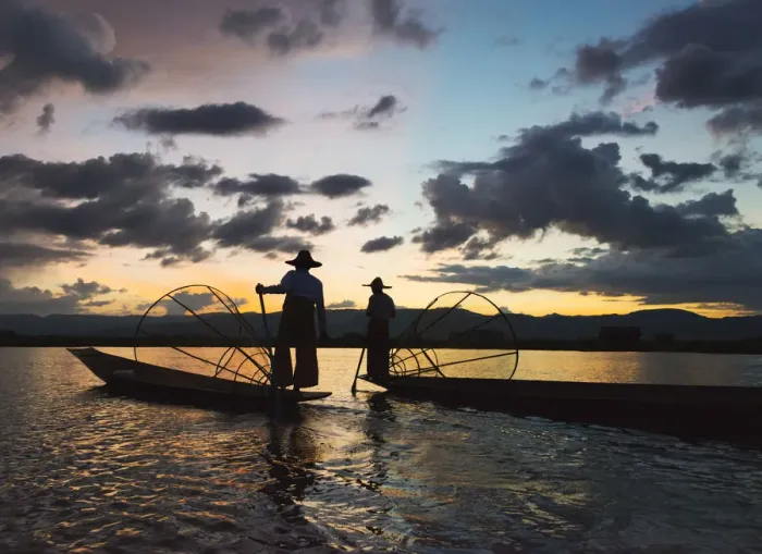 Framed Print : Intha fisherman rowing boat with leg at sunset on Inle Lake, Shan State, Myanmar
