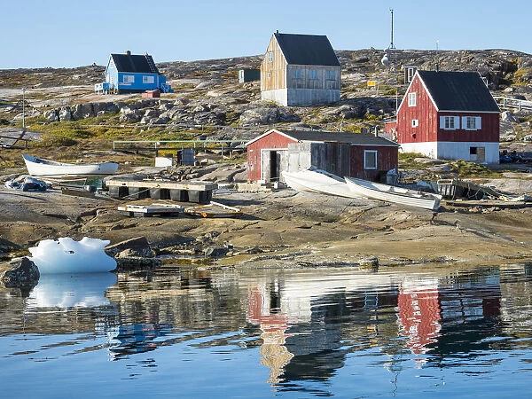 Inuit village Oqaatsut (once called Rodebay) located in Disko Bay. Greenland, Denmark