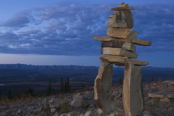 Inukshuk (traditional rock marker) in Ogilvie Mountains, northern Yukon