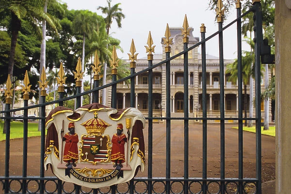 Iolani Palace and gate in old Honolulu