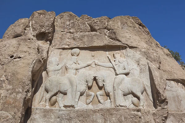 Iran, Central Iran, Shiraz, Naqsh-e Rostam, Sassanian stone reliefs cut into mountain