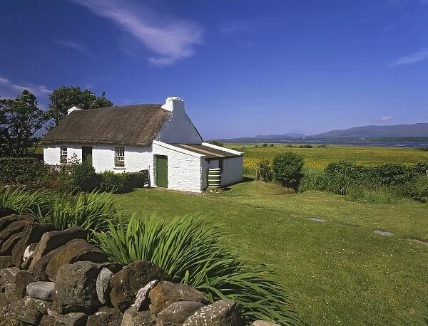 Ireland, Bay of Donegal. Thatched-roof cottage in County Donegal
