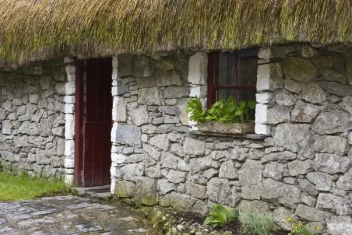 Framed Print : Ireland, Bunratty, County Clare. Traditional thatch and stone cottage in Bunratty Castle